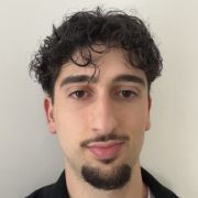 Ali G.